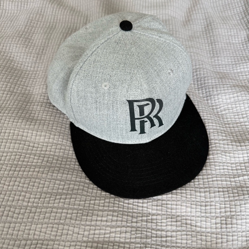 Rick Ross Men’s Three In Gray and Black Snapback Hat Cap